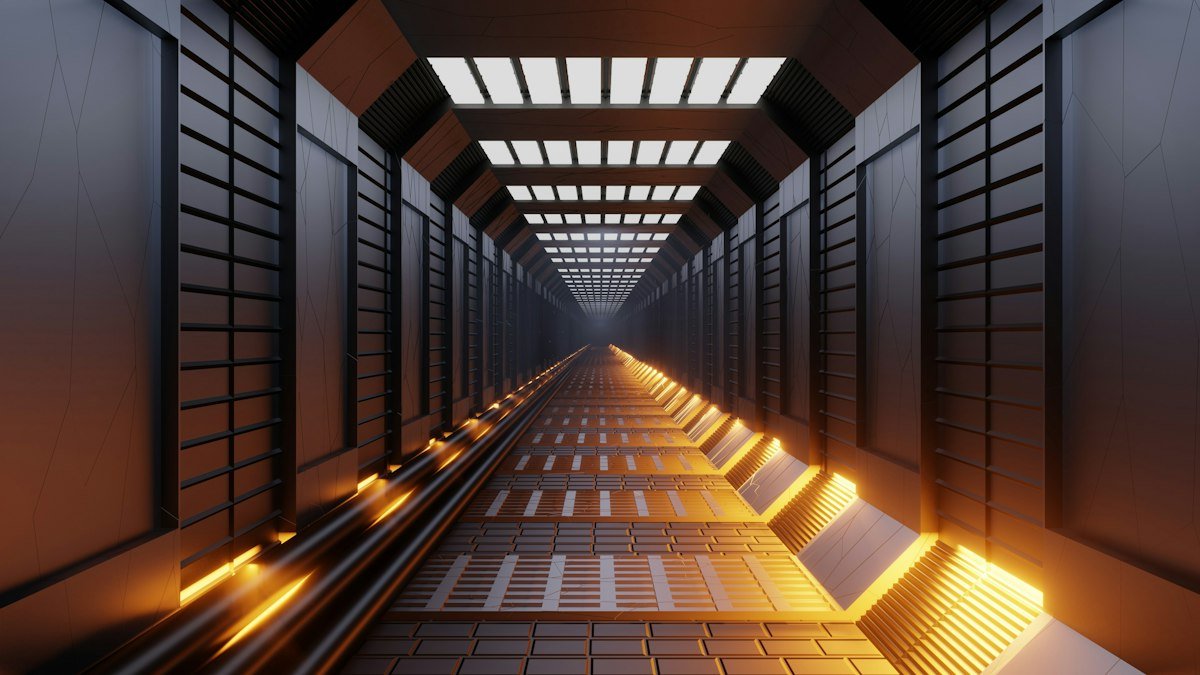 Photo by Shubham Dhage on Unsplash. Source: https://unsplash.com/photos/a-very-long-hallway-with-some-lights-on-orl3NGDKOnI (Unsplash License).