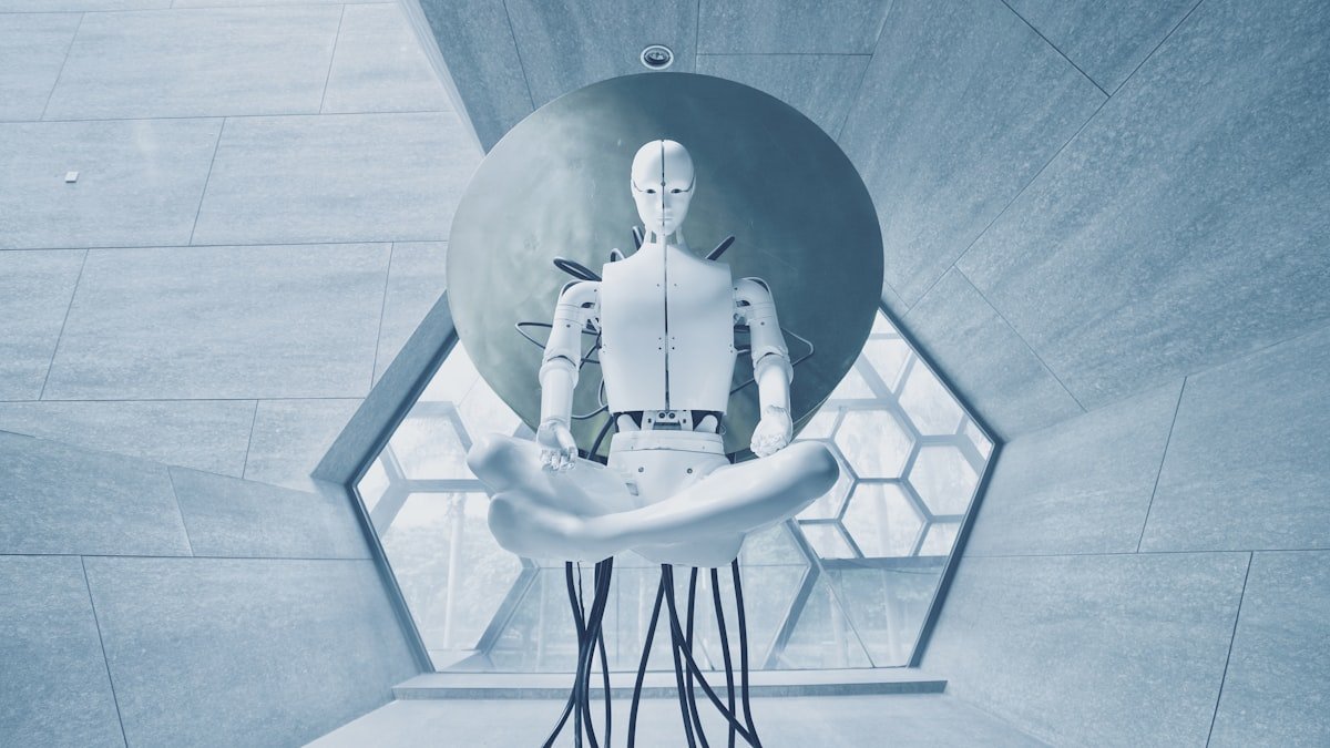 Photo by Aideal Hwa on Unsplash. Source: https://unsplash.com/photos/humanoid-robot-in-lotus-position-OYzbqk2y26c (Unsplash License).