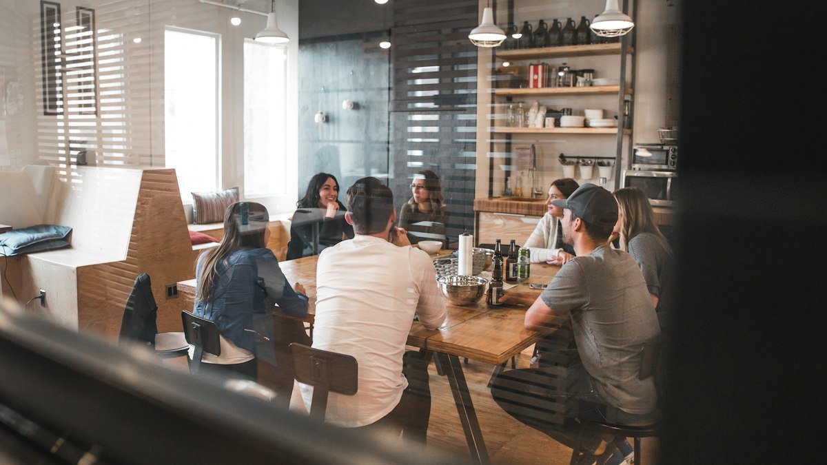 Photo by Redd Francisco on Unsplash. Source: https://unsplash.com/photos/people-sitting-on-chair-5U_28ojjgms (Unsplash License).