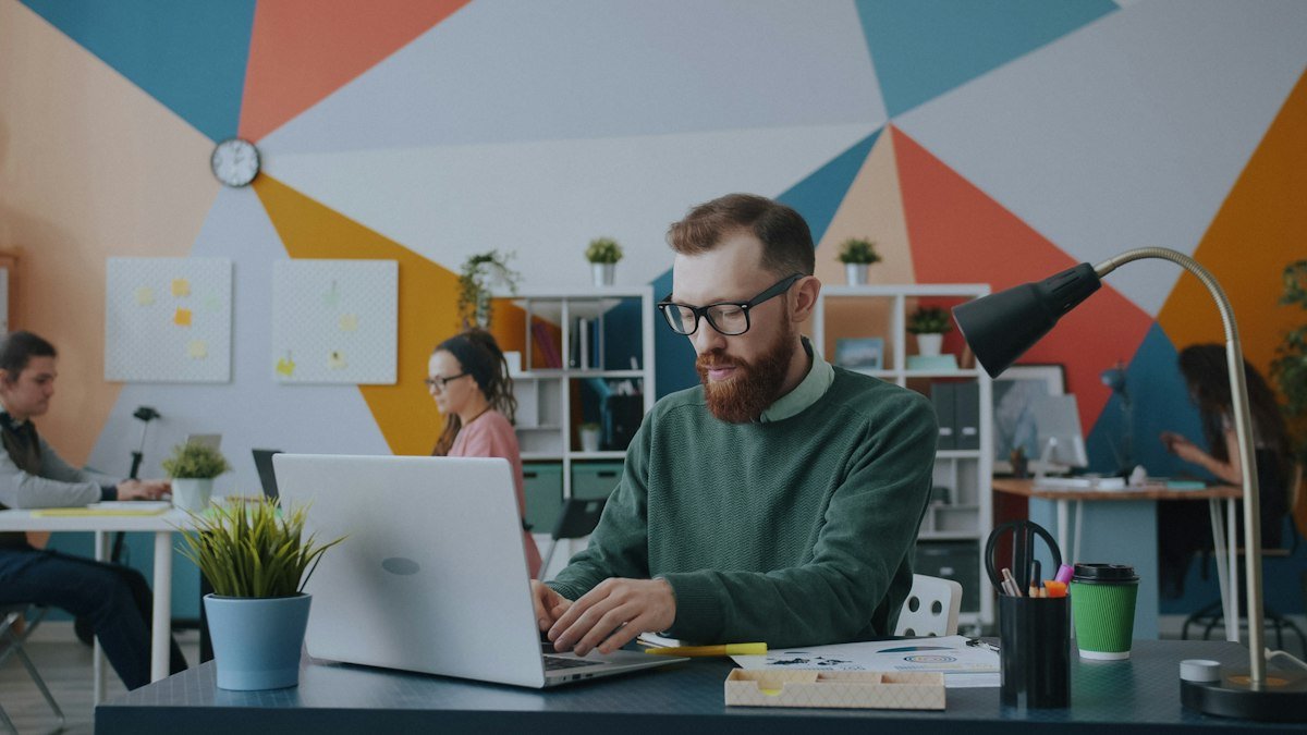 Photo by Vitaly Gariev on Unsplash. Source: https://unsplash.com/photos/man-typing-on-laptop-in-office-xTkgoZnCRSU (Unsplash License).