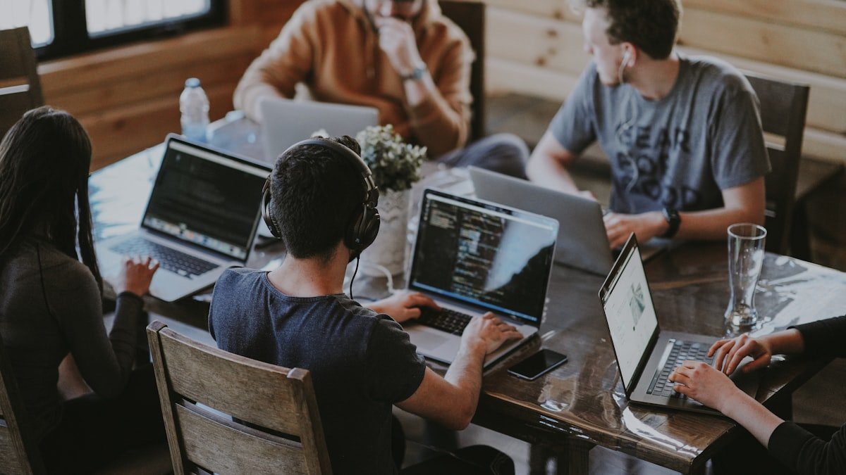 Photo by Annie Spratt on Unsplash. Source: https://unsplash.com/photos/group-of-people-using-laptop-computer-QckxruozjRg (Unsplash License).