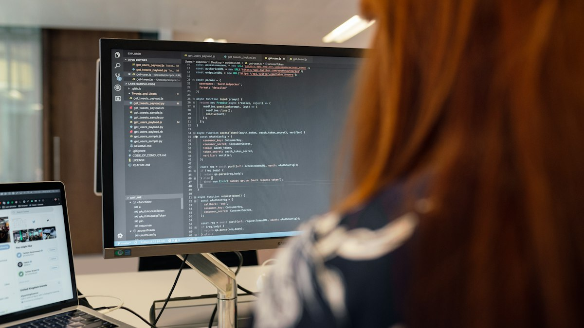 Photo by ThisisEngineering on Unsplash. Source: https://unsplash.com/photos/woman-in-black-and-white-jacket-sitting-in-front-of-computer-monitor-iQqRM0XJvn8 (Unsplash License).