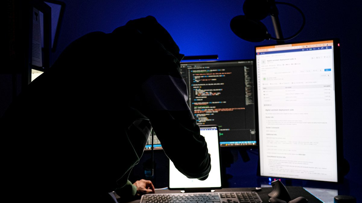 Photo by Boitumelo on Unsplash. Source: https://unsplash.com/photos/a-man-sitting-in-front-of-a-computer-monitor-eaVaEMs9FQA (Unsplash License).