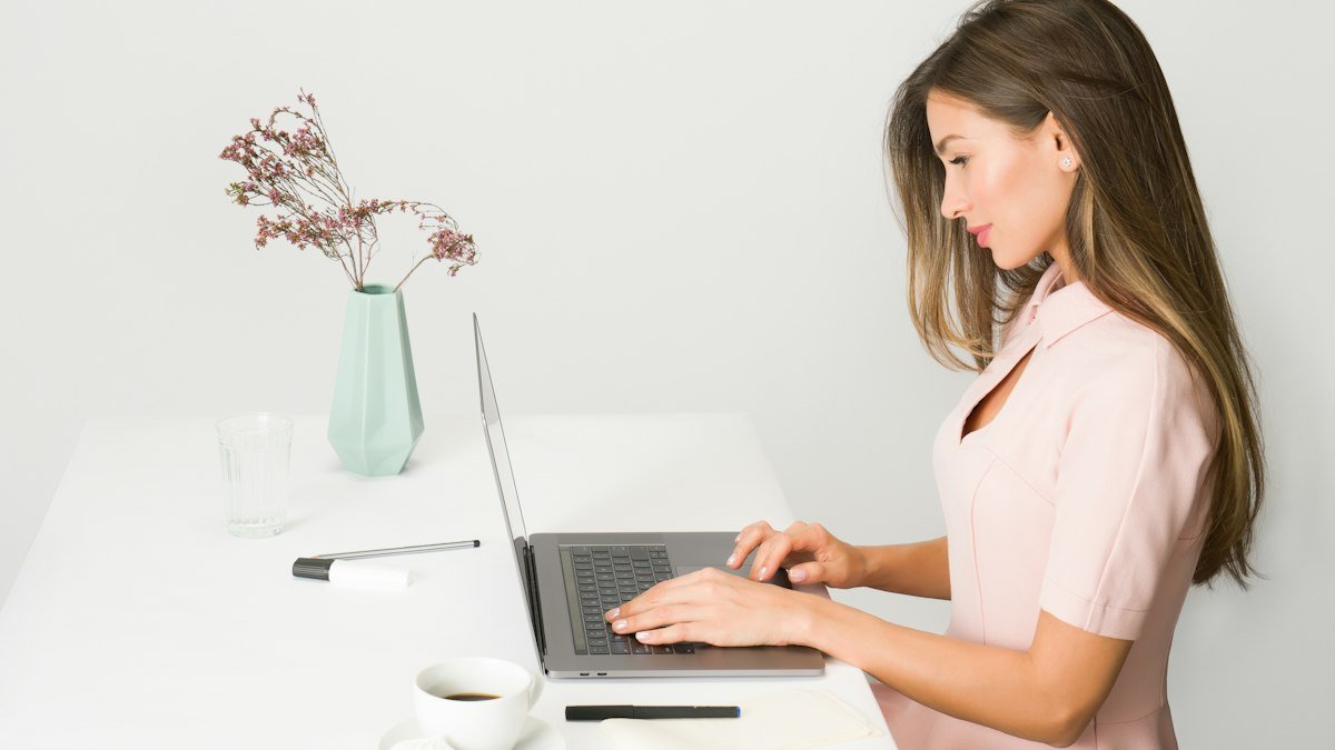 Photo by Icons8 Team on Unsplash. Source: https://unsplash.com/photos/woman-sitting-while-using-laptop-CrW-TbykPBQ (Unsplash License).
