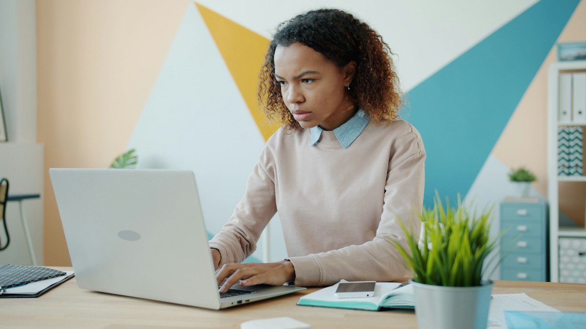 Photo by Vitaly Gariev on Unsplash. Source: https://unsplash.com/photos/young-woman-concentrating-while-working-on-a-laptop-SjvJdV_dNAk (Unsplash License).