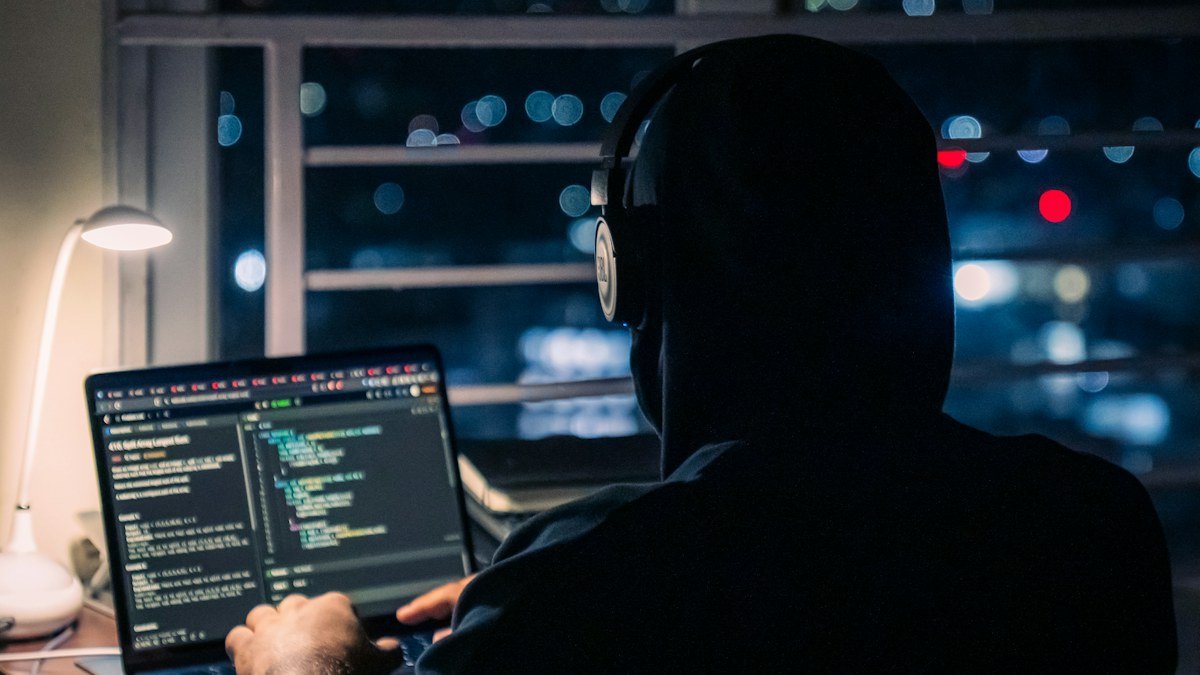 Photo by Chirayu Trivedi on Unsplash. Source: https://unsplash.com/photos/a-person-is-coding-on-a-laptop-at-night-M1yPeeHZ08w (Unsplash License).