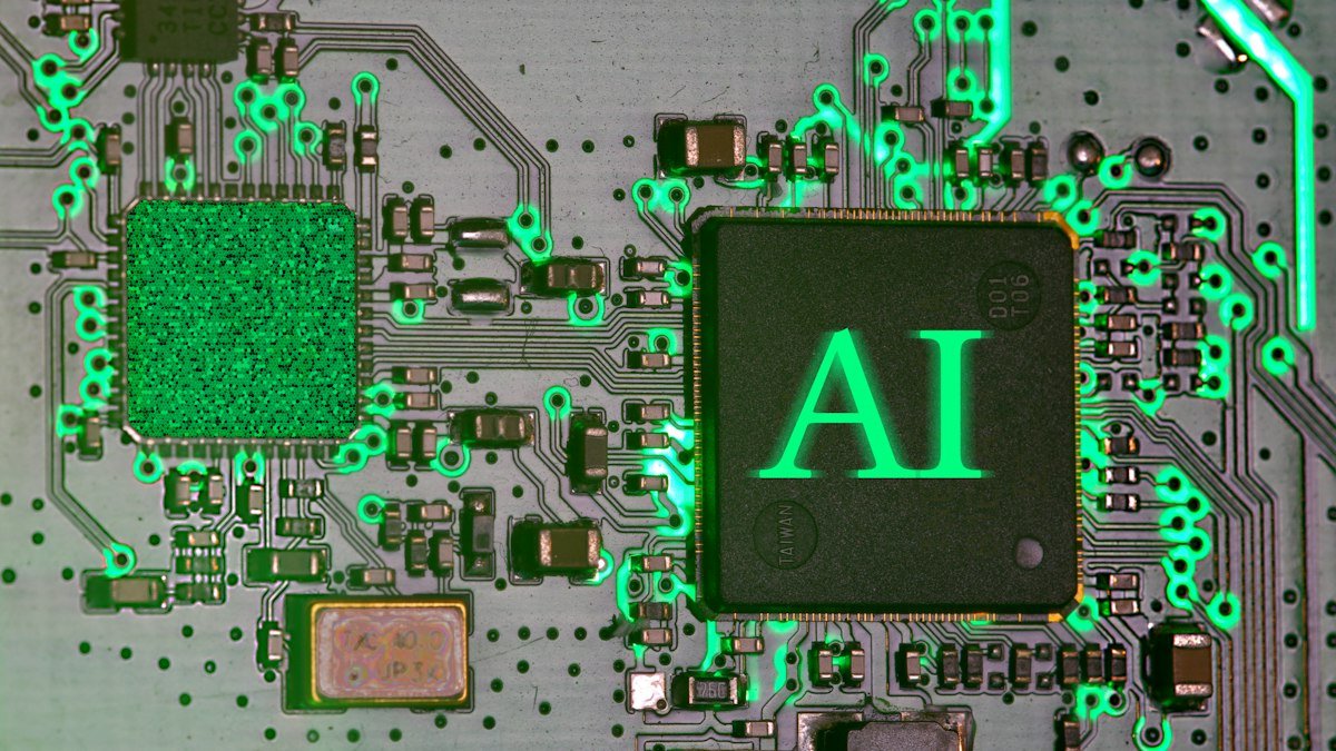 Photo by Immo Wegmann on Unsplash. Source: https://unsplash.com/photos/glowing-ai-chip-on-a-circuit-board-w69Z8K-HGQU (Unsplash License).