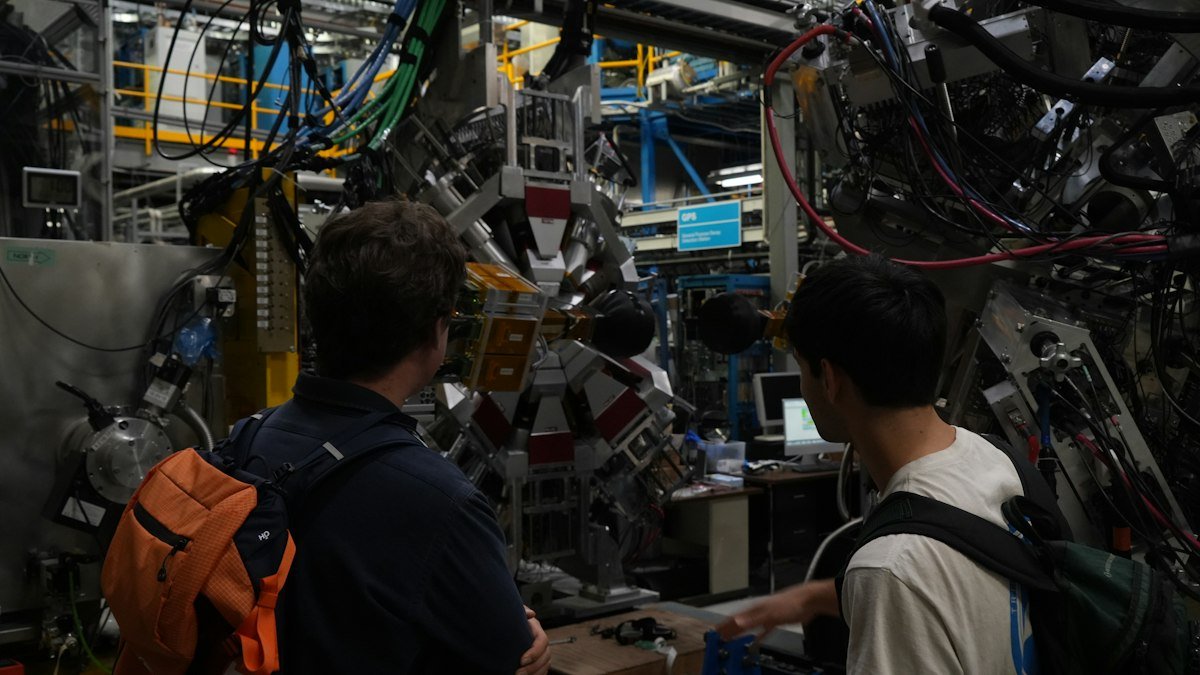 Photo by Daniel Miksha on Unsplash. Source: https://unsplash.com/photos/two-people-observing-complex-scientific-equipment-in-a-lab-kB6uJtsVVNs (Unsplash License).